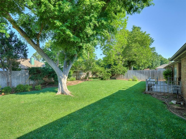 view of yard featuring a deck