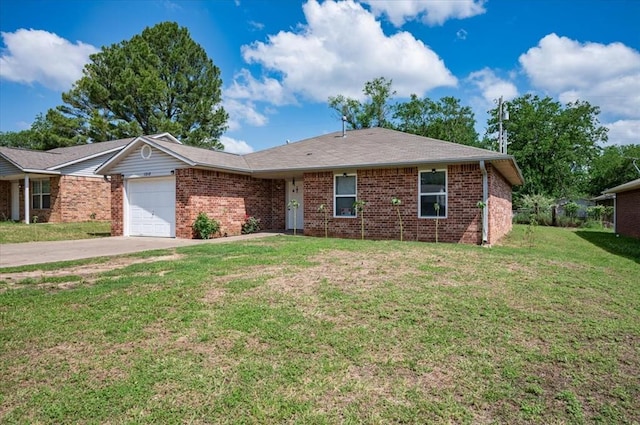 ranch-style home featuring driveway, brick siding, an attached garage, and a front yard