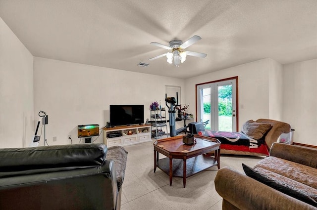 living room with a ceiling fan