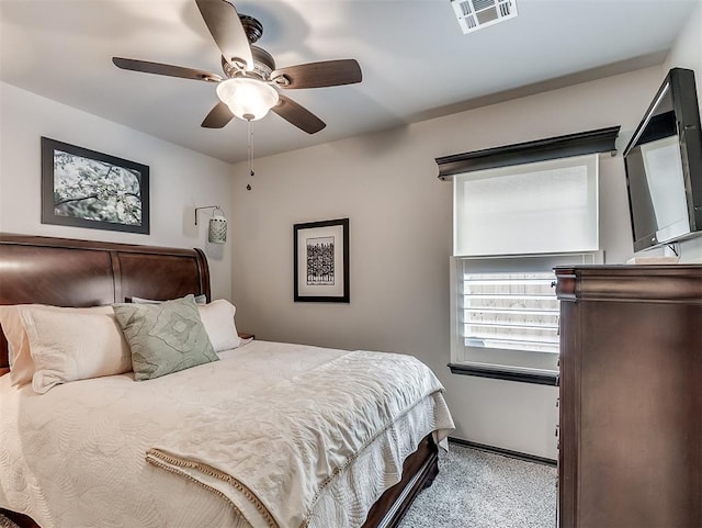 carpeted bedroom featuring a ceiling fan