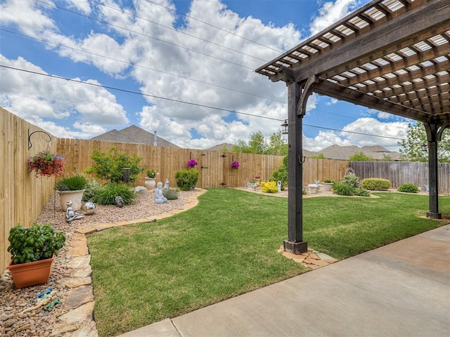 view of yard with a pergola and a patio area