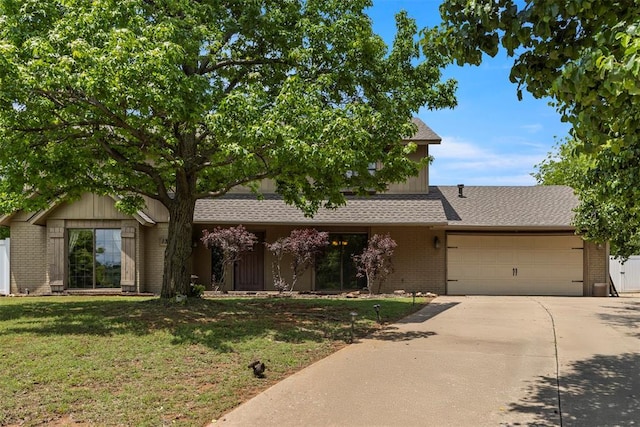 view of front facade with brick siding, an attached garage, driveway, and roof with shingles