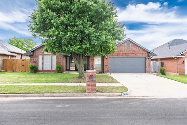 8109 Dawn Cir, Oklahoma City, OK 73135 - view of front of home featuring brick siding, an attached garage, and concrete driveway