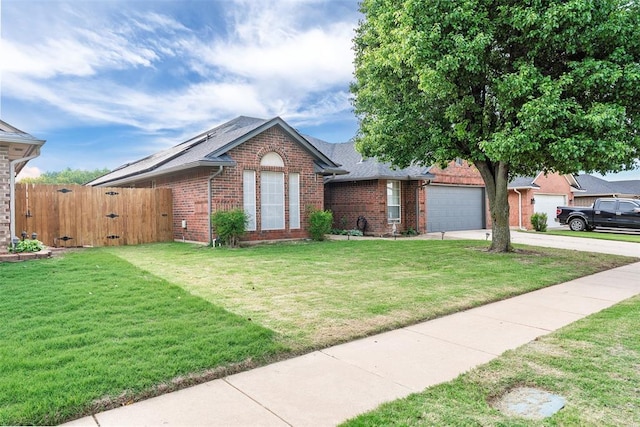 8109 Dawn Cir, Oklahoma City, OK 73135 - view of front of house featuring concrete driveway, brick siding, a garage, a gate, and a shingled roof