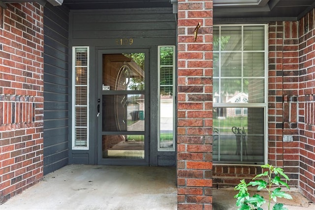 8109 Dawn Cir, Oklahoma City, OK 73135 - property entrance featuring brick siding