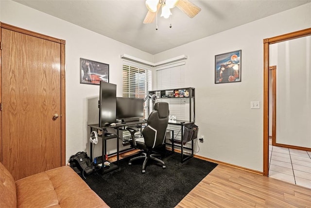 8109 Dawn Cir, Oklahoma City, OK 73135 - office space with a ceiling fan, wood finished floors, and baseboards