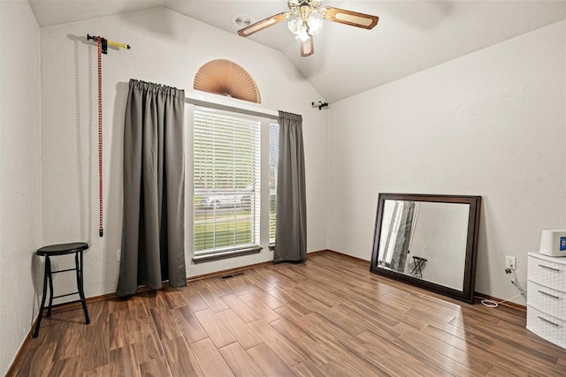 8109 Dawn Cir, Oklahoma City, OK 73135 - spare room with lofted ceiling, wood finished floors, and ceiling fan