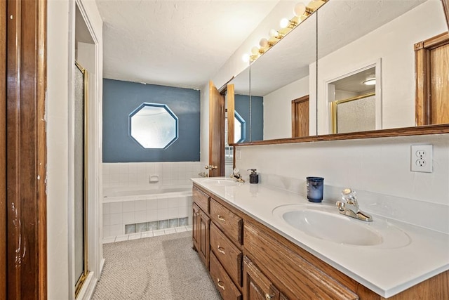 8109 Dawn Cir, Oklahoma City, OK 73135 - bathroom with a shower stall, a garden tub, and double vanity