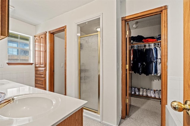 8109 Dawn Cir, Oklahoma City, OK 73135 - full bath with a shower stall, a spacious closet, and double vanity