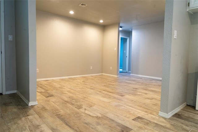 201 Lois Ave, Tuttle, OK 73089 - unfurnished room featuring light wood-type flooring, recessed lighting, and baseboards