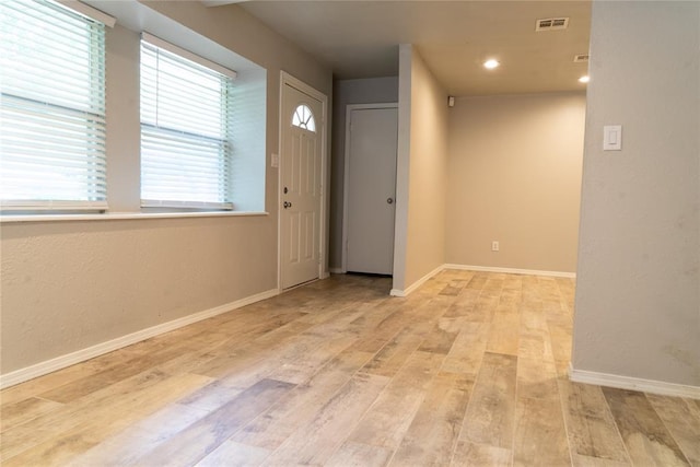 201 Lois Ave, Tuttle, OK 73089 - entrance foyer featuring light wood finished floors, baseboards, and recessed lighting