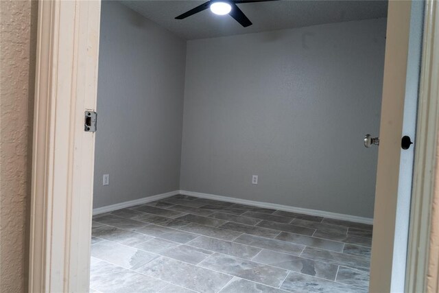 201 Lois Ave, Tuttle, OK 73089 - unfurnished room with ceiling fan and baseboards