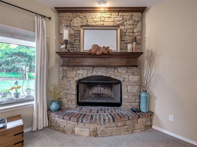 3570 Riverwood Ln, Edmond, OK 73034 - detailed view of carpet floors, a large fireplace, and baseboards