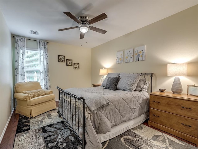 3570 Riverwood Ln, Edmond, OK 73034 - bedroom with light wood finished floors, baseboards, and ceiling fan