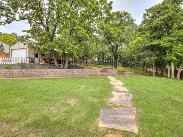 3570 Riverwood Ln, Edmond, OK 73034 - view of yard featuring an outdoor structure and a detached garage