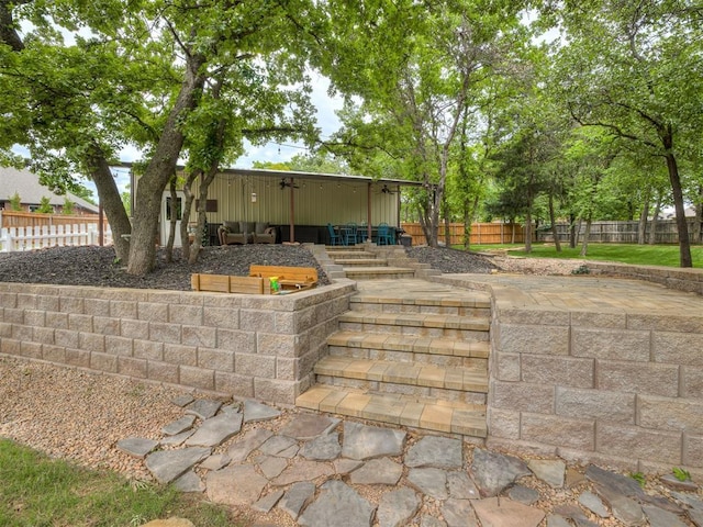 3570 Riverwood Ln, Edmond, OK 73034 - view of side of property with a fenced backyard and a patio