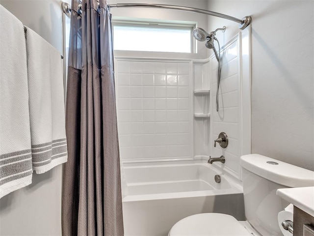 10301 NW 25th St, Yukon, OK 73099 - bathroom featuring toilet and shower / bath combo with shower curtain