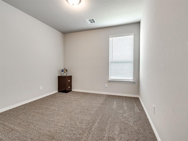10301 NW 25th St, Yukon, OK 73099 - unfurnished room with carpet and baseboards
