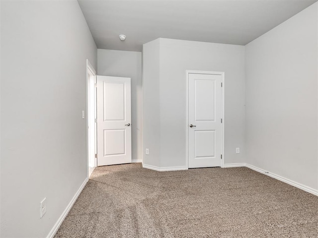 10301 NW 25th St, Yukon, OK 73099 - unfurnished bedroom featuring carpet and baseboards