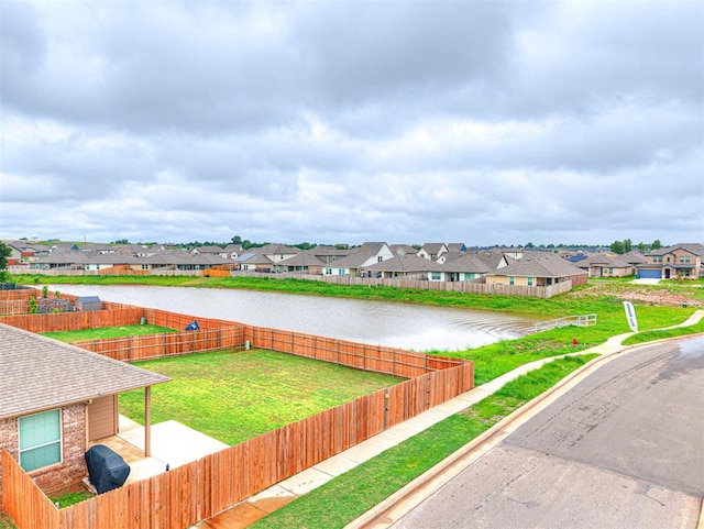 10301 NW 25th St, Yukon, OK 73099 - water view with nearby suburban area and a fenced backyard