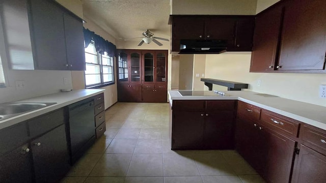 kitchen featuring black appliances, under cabinet range hood, a ceiling fan, light countertops, and a textured ceiling