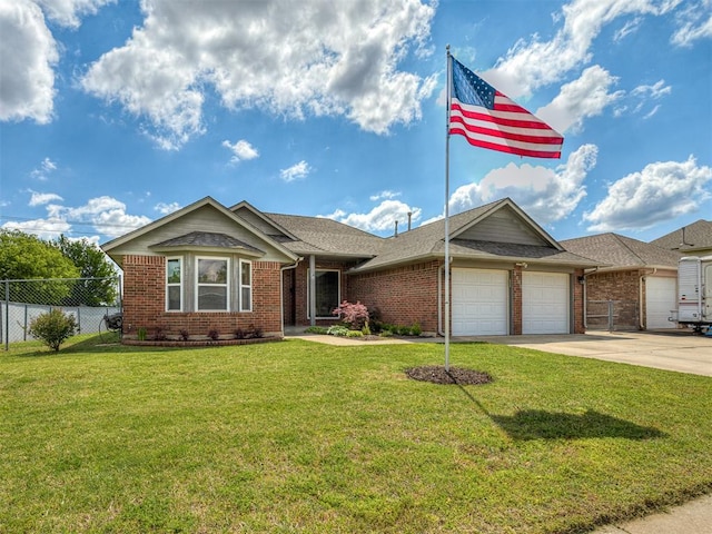 4900 Republic Dr, Oklahoma City, OK 73135 - single story home with a garage, brick siding, and driveway