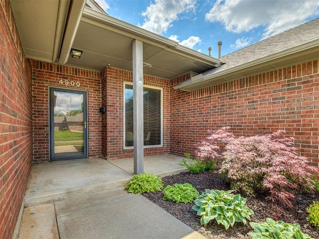 4900 Republic Dr, Oklahoma City, OK 73135 - property entrance with brick siding