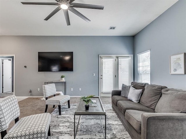 4900 Republic Dr, Oklahoma City, OK 73135 - carpeted living area with ceiling fan and baseboards
