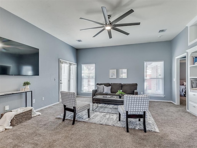 4900 Republic Dr, Oklahoma City, OK 73135 - living room featuring carpet flooring, a ceiling fan, and baseboards