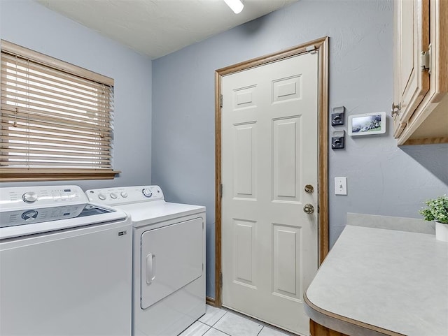 4900 Republic Dr, Oklahoma City, OK 73135 - laundry room featuring cabinet space, separate washer and dryer, and light tile patterned floors