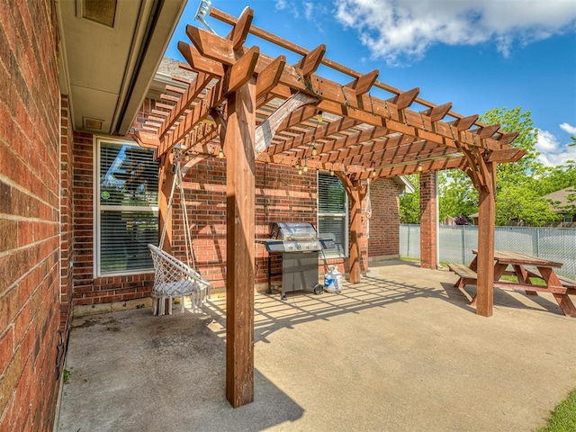 4900 Republic Dr, Oklahoma City, OK 73135 - view of patio with a pergola, fence, and grilling area