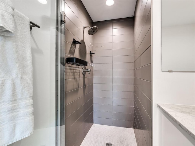 full bathroom featuring a stall shower