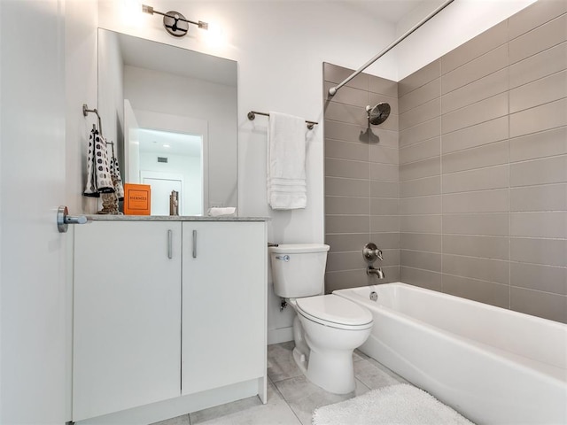 full bath featuring bathtub / shower combination, toilet, tile patterned flooring, and vanity