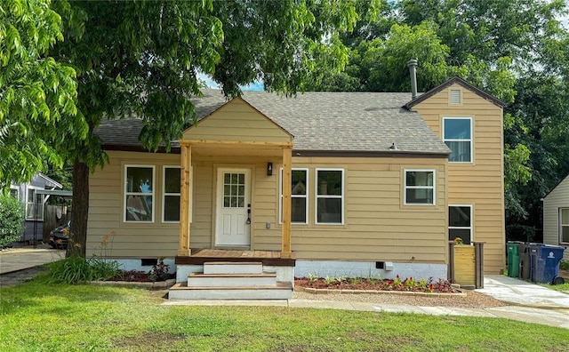 1212 NW 48th St, Oklahoma City, OK 73118 - bungalow-style home with crawl space, a front yard, and a shingled roof
