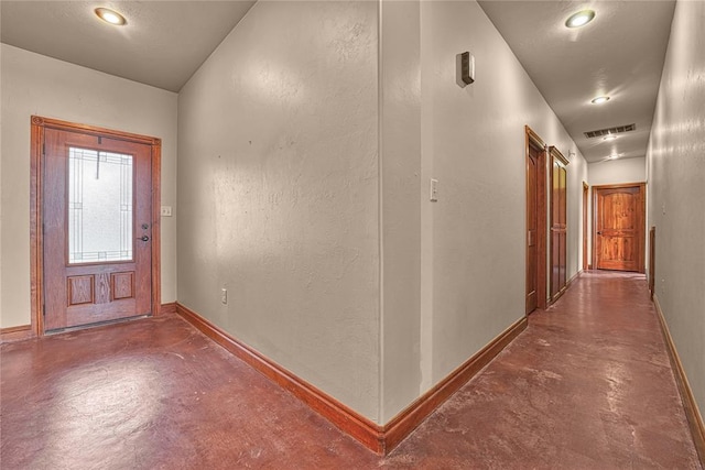 21698 SW Coombs Rd, Cache, OK 73527 - entrance foyer with concrete flooring, baseboards, and recessed lighting