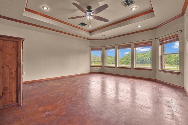 21698 SW Coombs Rd, Cache, OK 73527 - unfurnished room with a raised ceiling, ornamental molding, concrete floors, baseboards, and a ceiling fan