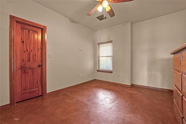 21698 SW Coombs Rd, Cache, OK 73527 - unfurnished room with concrete flooring, a ceiling fan, and baseboards