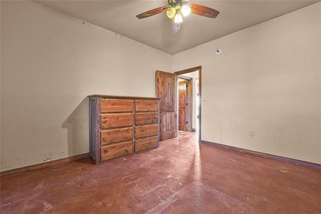 21698 SW Coombs Rd, Cache, OK 73527 - unfurnished bedroom featuring concrete floors, baseboards, and a ceiling fan