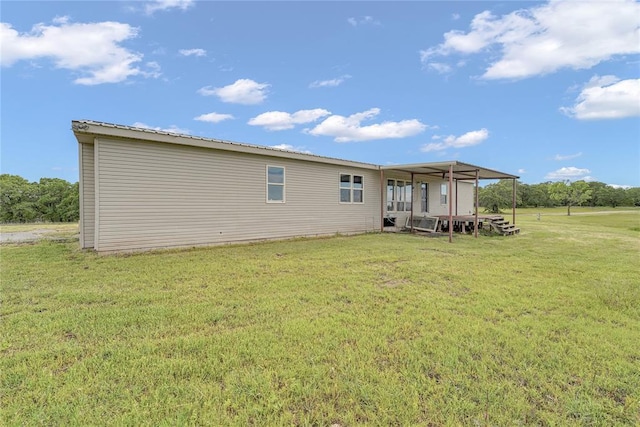 21698 SW Coombs Rd, Cache, OK 73527 - back of house featuring a yard