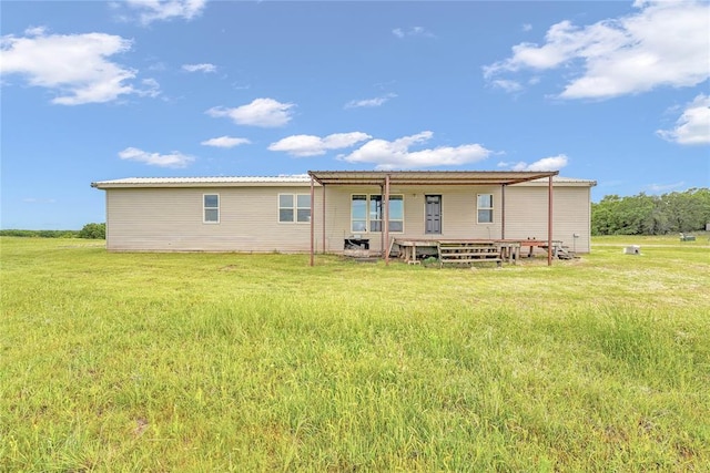 21698 SW Coombs Rd, Cache, OK 73527 - rear view of house featuring a yard