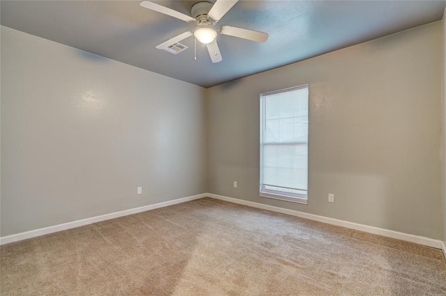 403 S Debra Ct Unit 401, Stillwater, OK 74074 - empty room with baseboards, ceiling fan, and light carpet