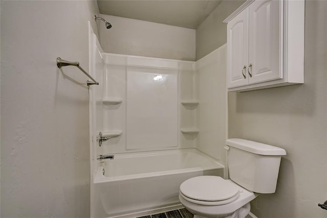 403 S Debra Ct Unit 401, Stillwater, OK 74074 - bathroom featuring toilet and shower / washtub combination
