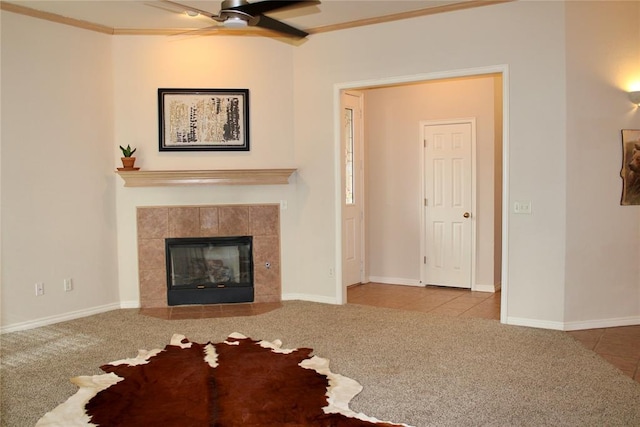15513 Swallowtail Rd, Edmond, OK 73013 - unfurnished living room with a ceiling fan, carpet, ornamental molding, a fireplace, and baseboards