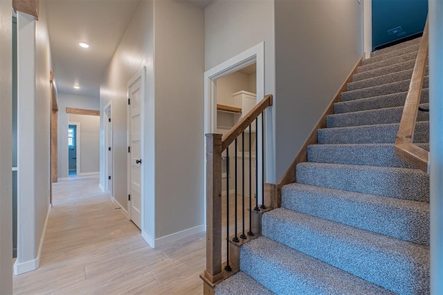 9205 Taggert Ln, Yukon, OK 73099 - staircase with wood finished floors, baseboards, and recessed lighting