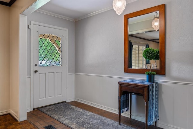 3804 NW 66th St, Oklahoma City, OK 73116 - foyer with crown molding, wainscoting, and a decorative wall