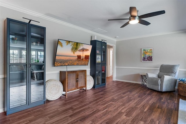 3804 NW 66th St, Oklahoma City, OK 73116 - sitting room with dark wood-type flooring, a ceiling fan, baseboards, and ornamental molding