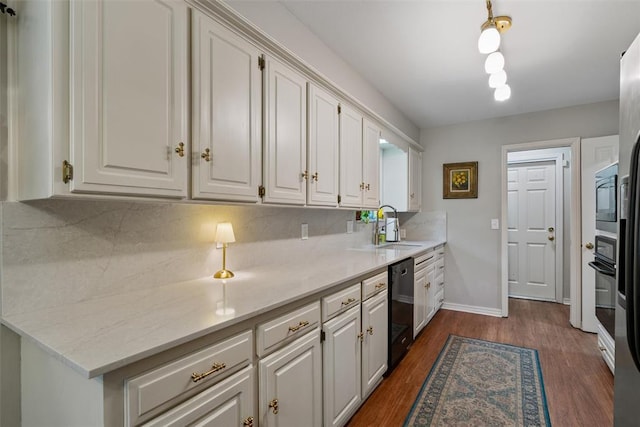 3804 NW 66th St, Oklahoma City, OK 73116 - kitchen with dishwasher, a sink, white cabinetry, and decorative backsplash