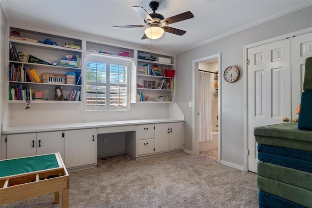 3804 NW 66th St, Oklahoma City, OK 73116 - office with built in desk, ceiling fan, crown molding, and light carpet