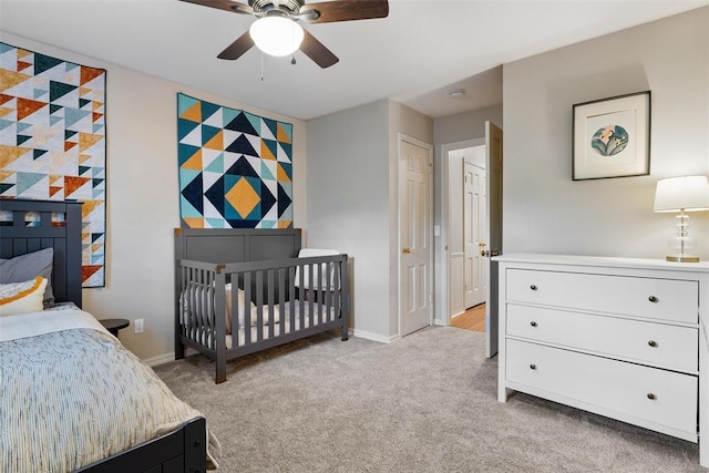 3804 NW 66th St, Oklahoma City, OK 73116 - bedroom featuring light colored carpet, baseboards, and a ceiling fan