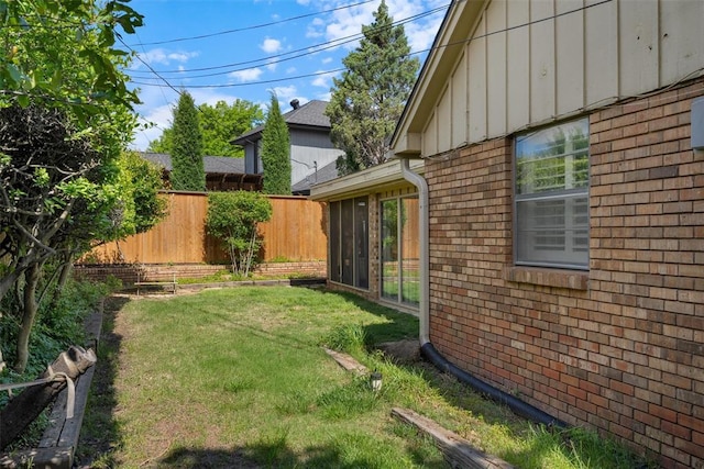 3804 NW 66th St, Oklahoma City, OK 73116 - view of yard with a sunroom